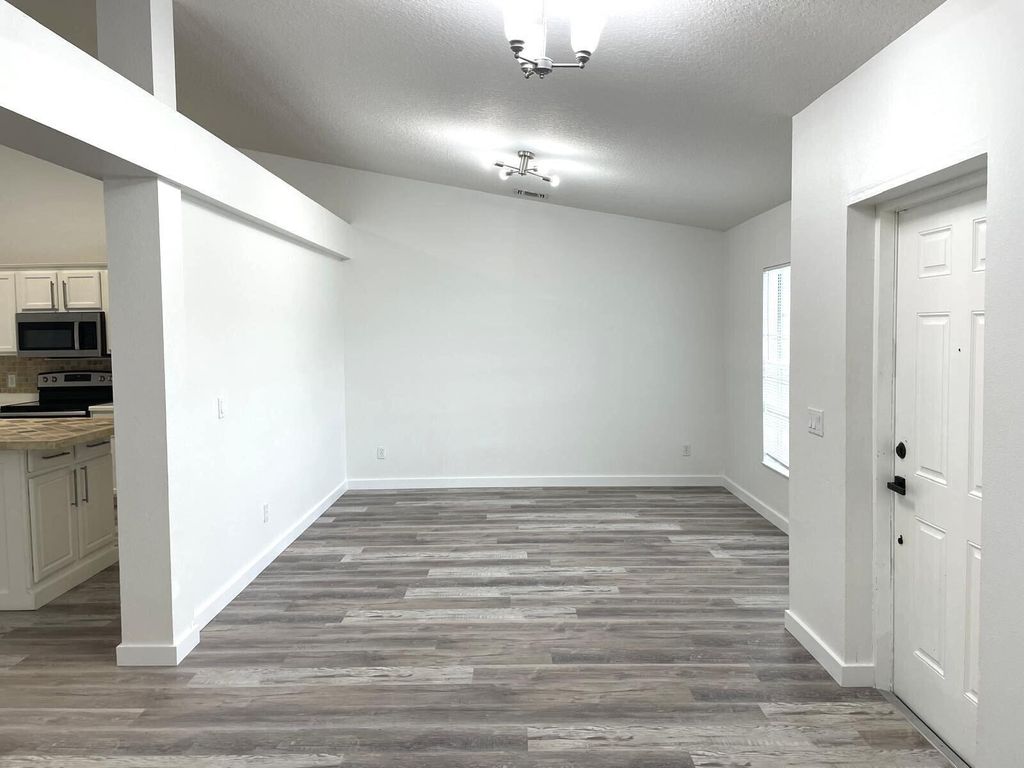 Photo of 1137 SW Coleman Avenue, Port Saint Lucie, FL 34953 (MLS # R11081024)