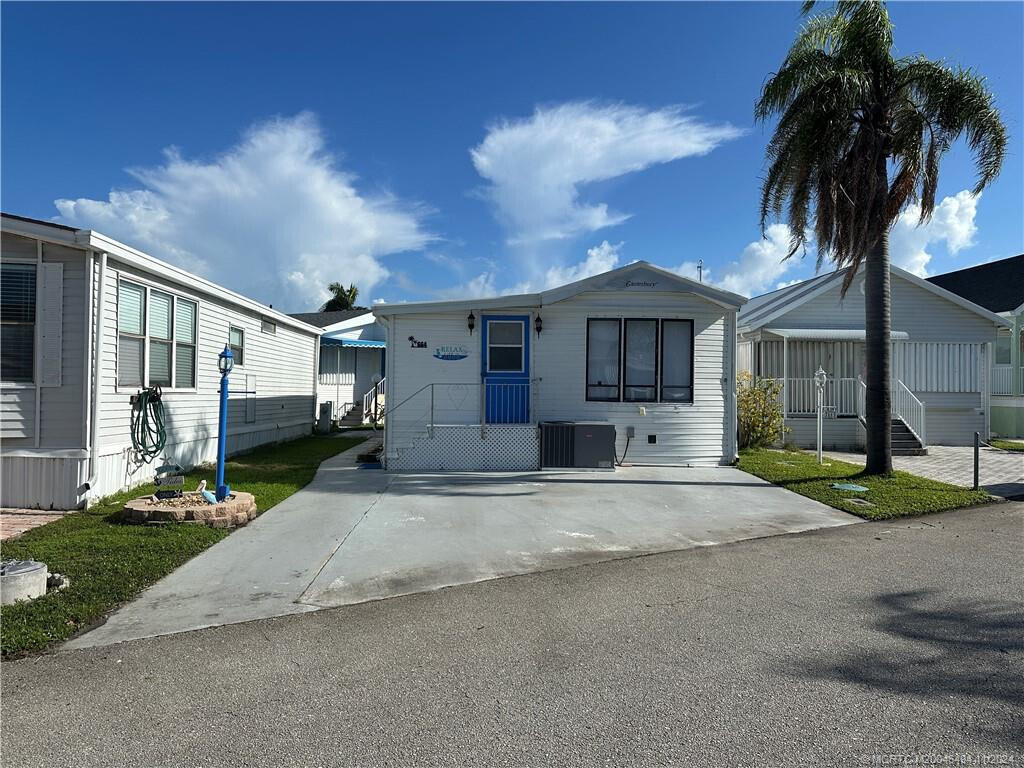 Photo of 664 Nettles Boulevard, Jensen Beach, FL 34957 (MLS # B26067524)