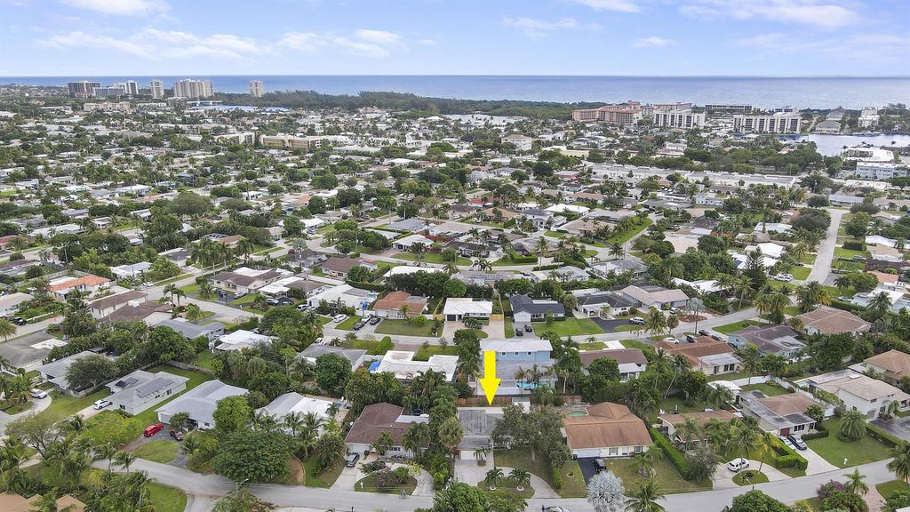 Photo of 2628 NE 25th Terrace, Boca Raton, FL 33431 (MLS # R10936411)