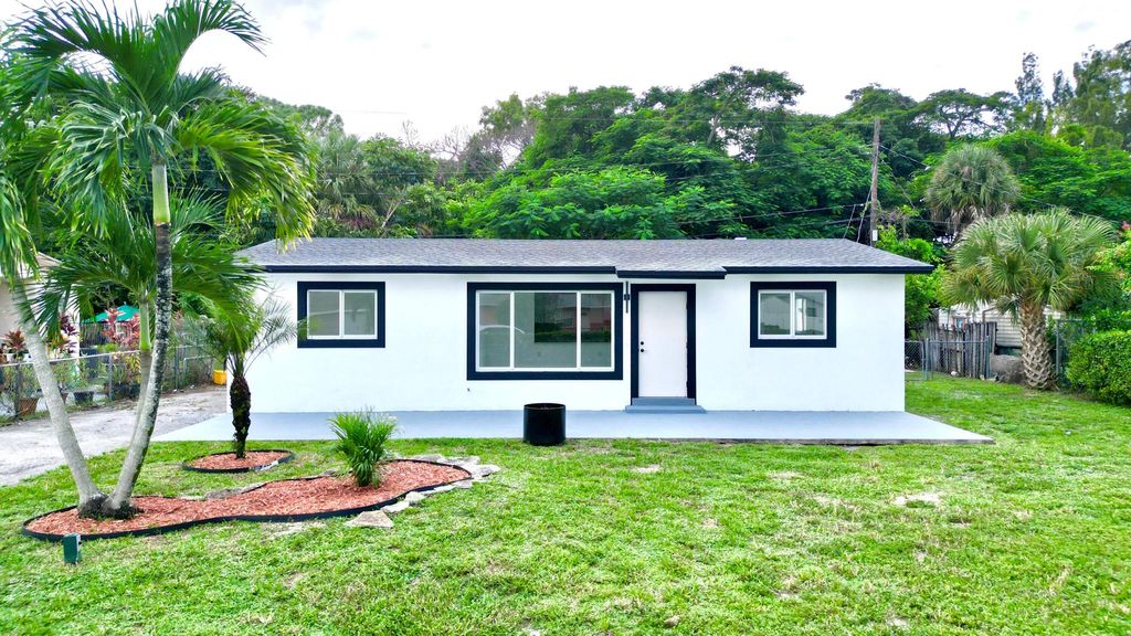 Photo of 773 Arlington Drive, West Palm Beach, FL 33415 (MLS # R11132657)
