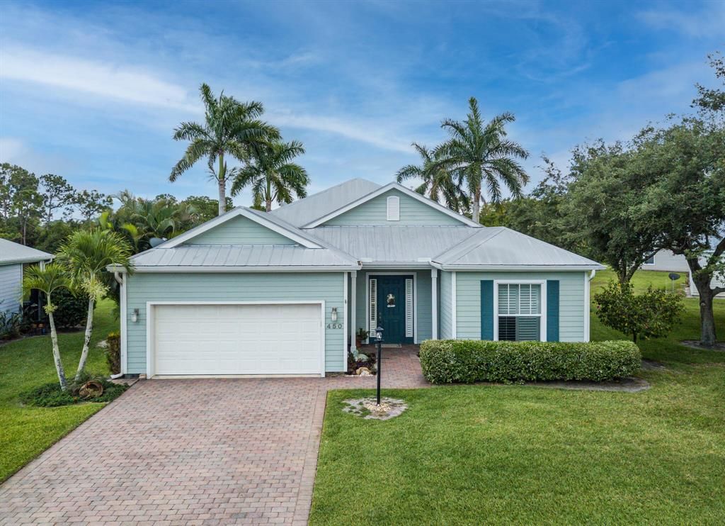 Photo of 450 NE Canoe Park Circle, Port Saint Lucie, FL 34983 (MLS # R10800182)