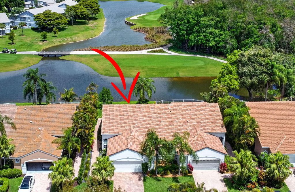 Photo of 4634 Carlton Golf Drive, Lake Worth, FL 33449 (MLS # B26014207)