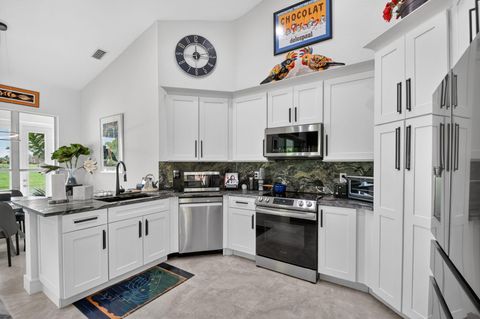 Tiny photo for 4634 Carlton Golf Drive, Lake Worth, FL 33449 (MLS # B26014207)