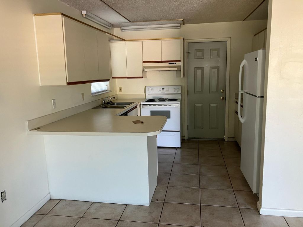 Photo of 3207 Mura Drive, Fort Pierce, FL 34982 (MLS # R11074435)