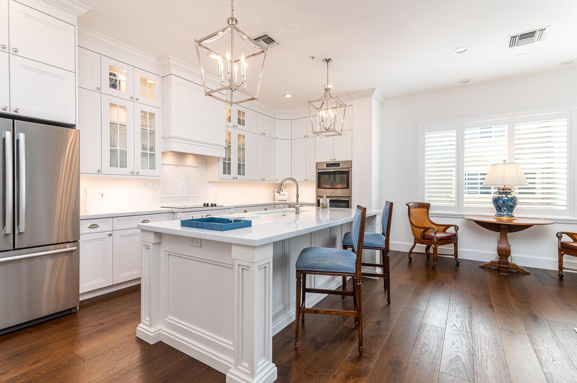Step into exquisite coastal luxury with this masterfully reimagined townhouse. Discover where modern design meets timeless sophistication in this meticulously curated home with 2-car Garage, Elevator, New 2025 Roof and Impact windows. This exclusive boutique community is just 1/2 bock from deeded Beach access, in the coveted Estates section of Boca Raton. All 3 ensuite bedrooms have large closets. Baths exude spa-like serenity with high-end finishes. This Palm Beach inspired residence is ideal for those seeking a coastal lifestyle where HOA fee covers: ins-Bldg., Lawn Care, Common Area, Mgt. Fee, & Roof Maint. Just a half block to the beach. Stroll to downtown Boca Raton's vibrant dining, shopping, The Boca Raton Resort, all moments away. A-Rated Schools.