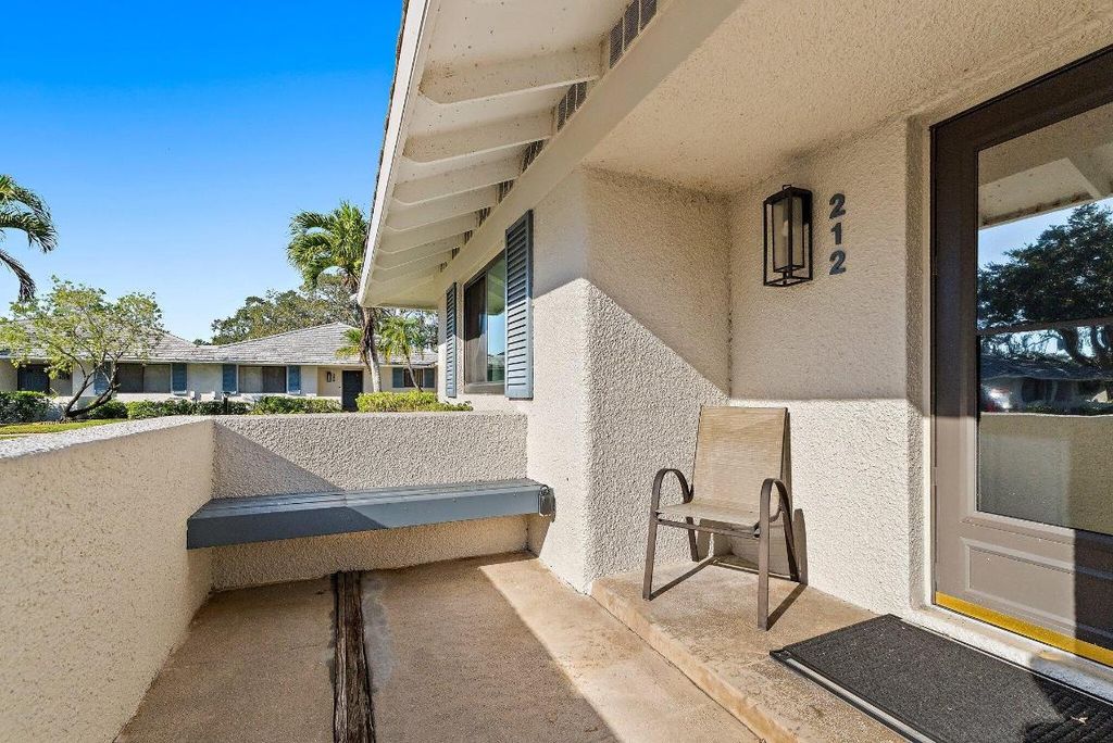 Photo of 212 Club Drive, Palm Beach Gardens, FL 33418 (MLS # R11146901)