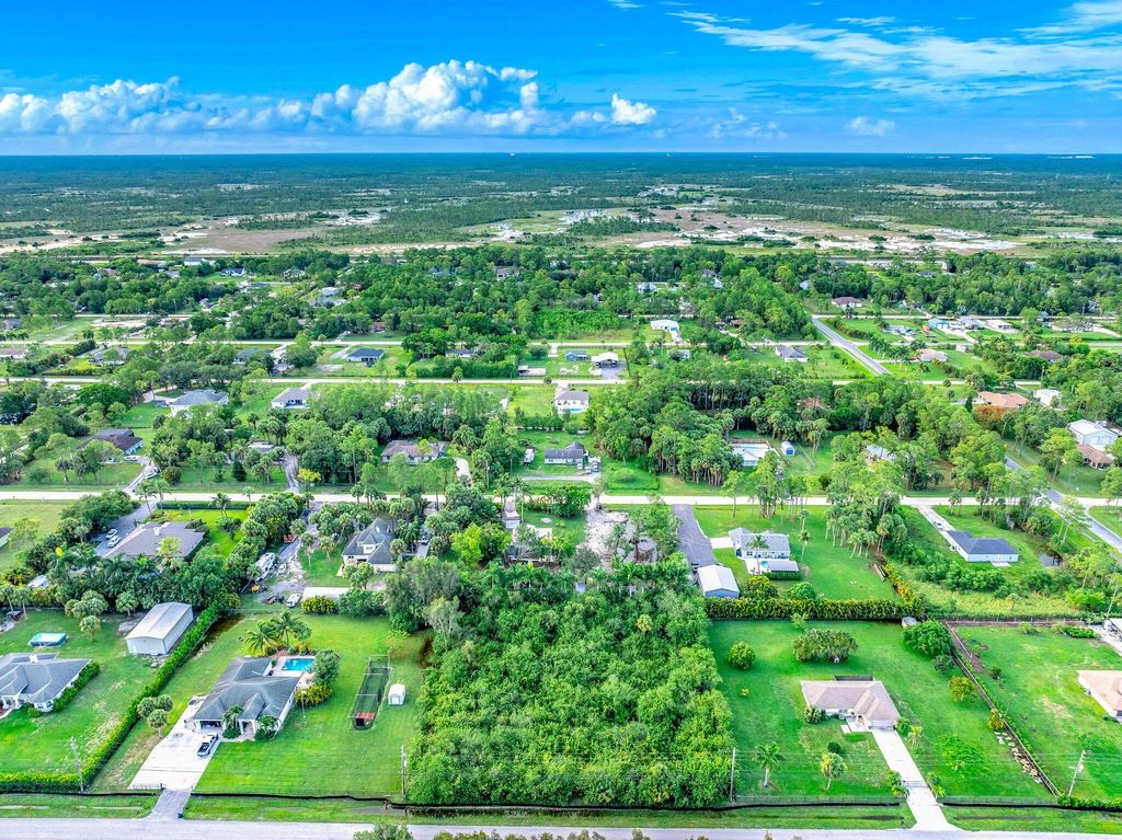 Photo of 18100 Hamlin Boulevard, The Acreage, FL 33470 (MLS # R11002265)