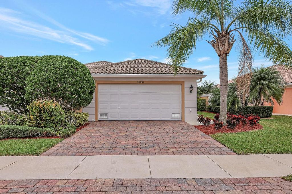 Photo of 12050 SW Elsinore Drive, Port Saint Lucie, FL 34987 (MLS # R10928464)