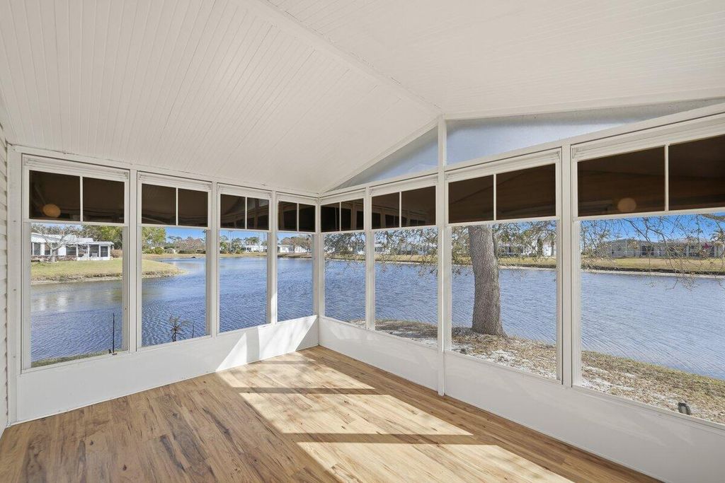 Photo of 8125 Meadowlark Lane, Port Saint Lucie, FL 34952 (MLS # R11165608)