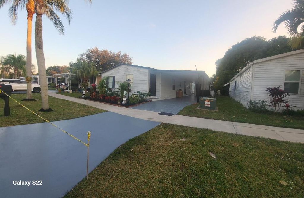 Photo of 3434 Nw 64th Ct, Lot K-4, Coconut Creek, FL 33073 (MLS # R11140566)