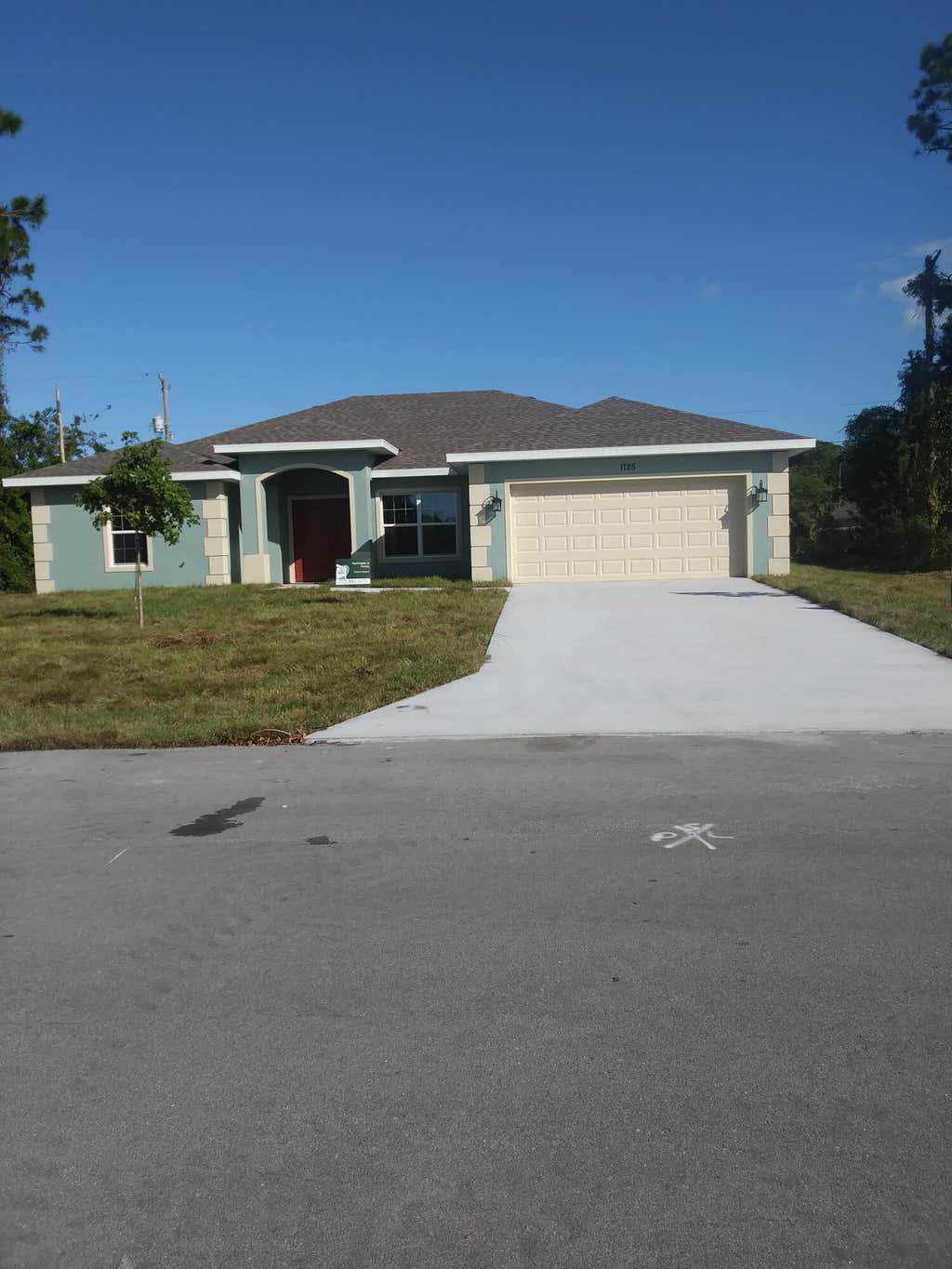 Photo of 1725 SW Finch Lane, Port Saint Lucie, FL 34953 (MLS # R10781086)