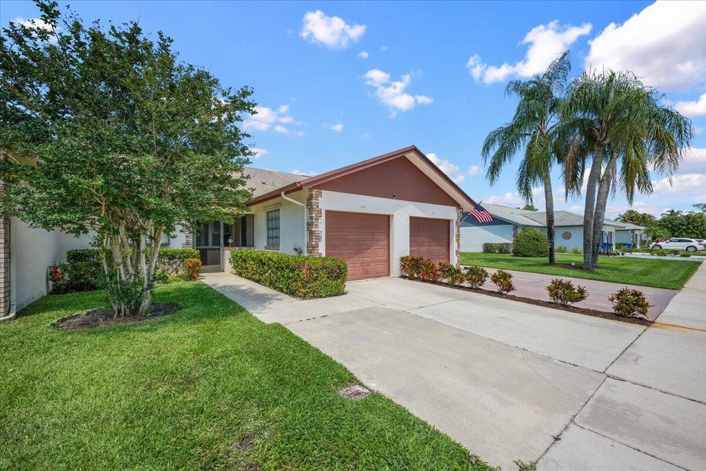 Photo of 129 Moccasin Trail S, Jupiter, FL 33458 (MLS # B26028690)