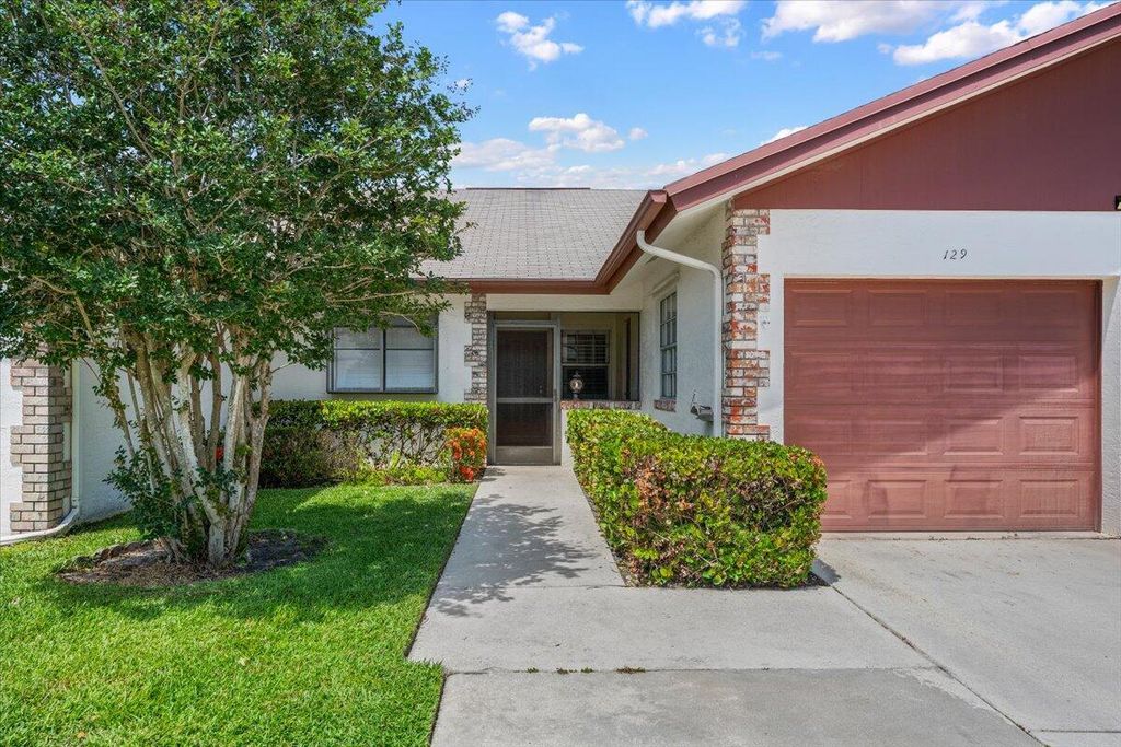 Photo of 129 Moccasin Trail S, Jupiter, FL 33458 (MLS # B26028690)