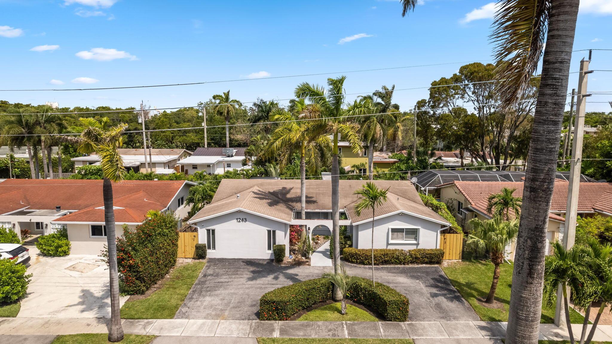 Welcome to 1243 Garfield Street, Hollywood, FL a spacious 4-bedroom, 2.5-bath home with over 2,200 sq ft, just minutes from the beach. Bright, open living areas connect seamlessly to a functional kitchen and comfortable bedrooms. The backyard is made for entertaining, with an oversized pool, cabana, and plenty of lounge space. This turnkey property has been successfully used as a short-term rental, offering flexible options for end-users or investors. Conveniently located Minutes Hollywood Beach and the Boardwalk, Downtown Hollywood, shopping, dining, and major and the Boardwalk , near Fort Lauderdale International Airport, Shopping, Gulfstream Park, YoungCircle