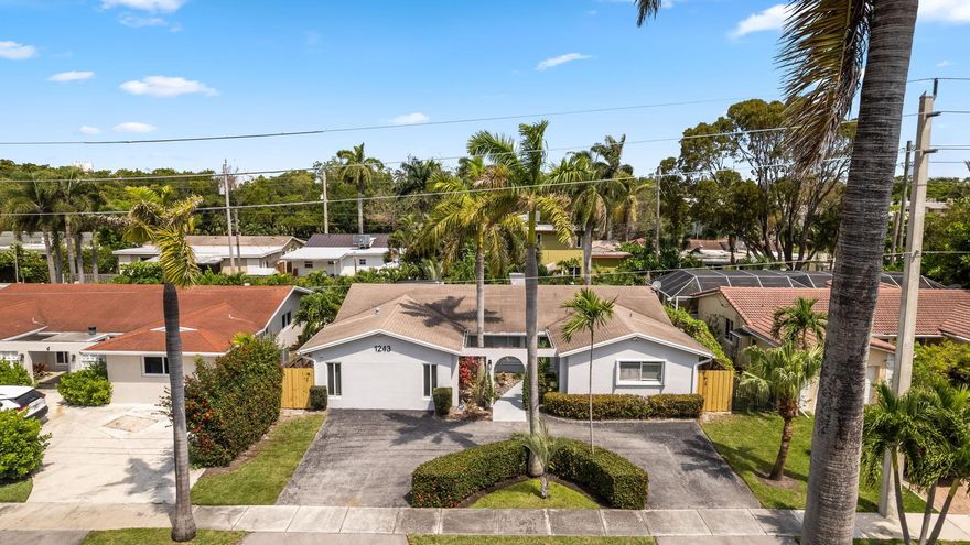 Welcome to 1243 Garfield Street, Hollywood, FL  a spacious 4-bedroom, 2.5-bath home with over 2,200 sq ft, just minutes from the beach. Bright, open living areas connect seamlessly to a functional kitchen and comfortable bedrooms. The backyard is made for entertaining, with an oversized pool, cabana, and plenty of lounge space. This turnkey property has been successfully used as a short-term rental, offering flexible options for end-users or investors. Conveniently located Minutes Hollywood Beach and the Boardwalk, Downtown Hollywood, shopping, dining, and major and the Boardwalk , near Fort Lauderdale International Airport, Shopping, Gulfstream Park, YoungCircle