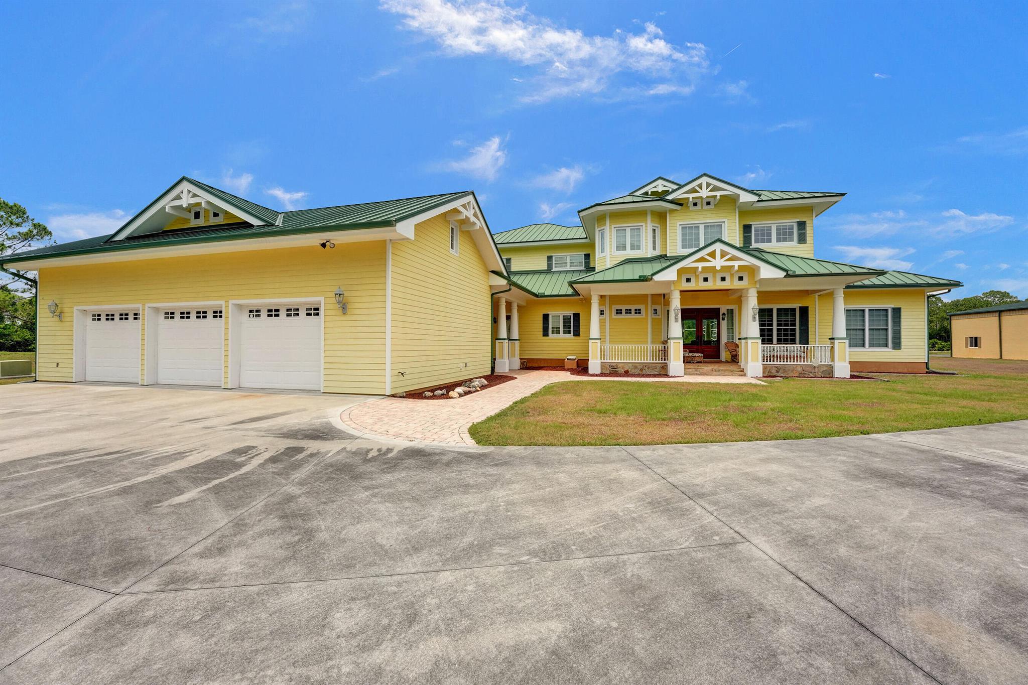 Back on market and has APPRAISED! Welcome to an extraordinary aviation estate at 15350 Skyking Dr, located in the prestigious Treasure Coast Airpark (FL37) in Port Saint Lucie, FL. This remarkable property offers aviation enthusiasts direct access to a 4,067' x 48' paved and lighted runway (10-28), perfectly situated halfway down the runway for unparalleled views of aircraft taking off and landing. Property Highlights: Residence: - Spacious Living: 4 bedrooms and 3 baths, plus an outdoor cabana bath with a toilet and shower. - Expansive Grounds: 14.65 acres across 2 lots, providing ample privacy and room for outdoor activities. - Gourmet Kitchen: Featuring Slate countertops from Maine, a Miele oven, and an expansive walk-in pantry with abundant storage.