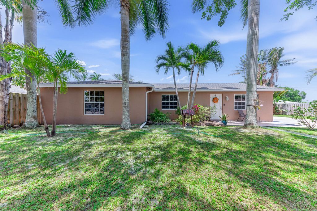 Photo of 9159 Honeywell Road, Lake Worth, FL 33467 (MLS # B26025964)