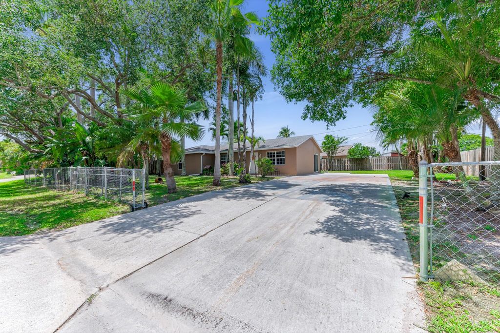 Photo of 9159 Honeywell Road, Lake Worth, FL 33467 (MLS # B26025964)