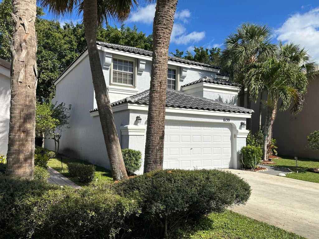 Photo of 6139 Branchwood Drive, Lake Worth, FL 33467 (MLS # B26039134)