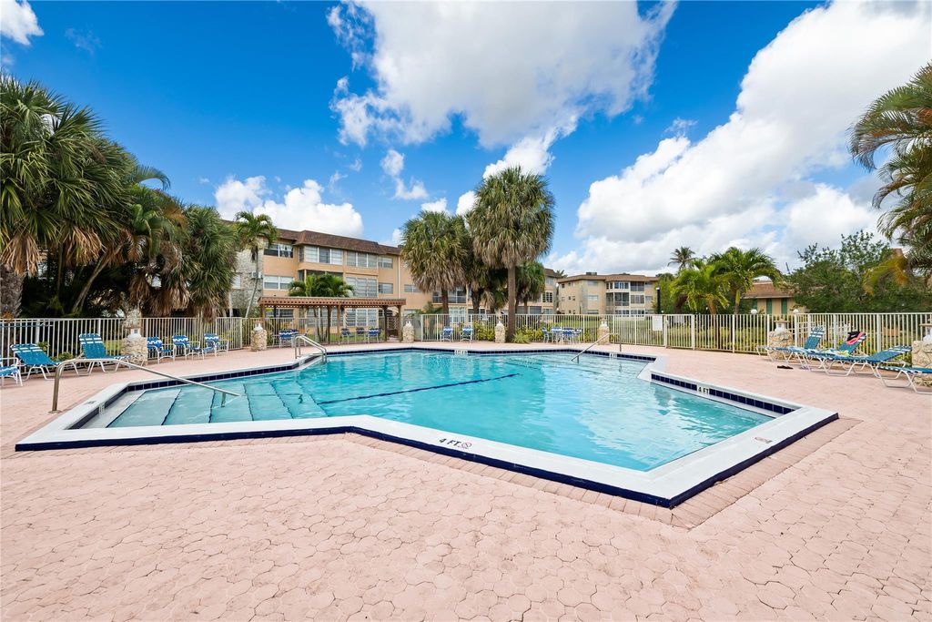 Photo of 5031 W Oakland Park Boulevard #309, Lauderdale Lakes, FL 33313 (MLS # F10552872)