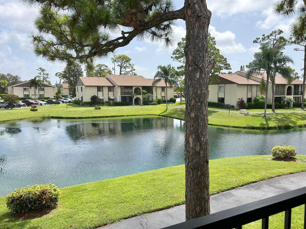 Photo of 327 Knotty Pine Circle #B-2, Greenacres, FL 33463 (MLS # R11110509)