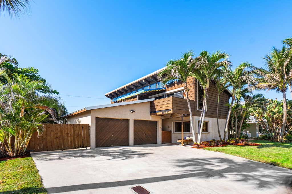 Photo of 14 Sailfish Lane, Ocean Ridge, FL 33435 (MLS # R11076583)