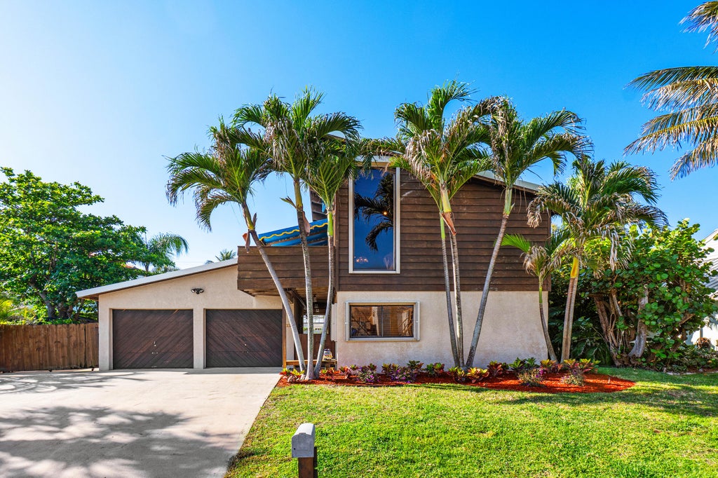 Photo of 14 Sailfish Lane, Ocean Ridge, FL 33435 (MLS # R11076583)