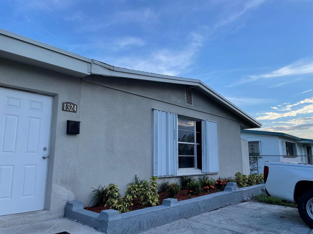 Photo of 1324 7th Street, West Palm Beach, FL 33401 (MLS # R10901772)