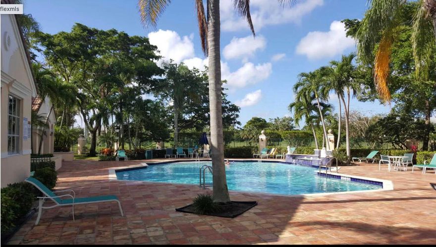 Beautifully Furnished, Move-in Ready, One Bdrm/One Bath, Quiet End Unit Condo, Located in the Gated Milano Condominiums on Village Blvd, TWO PARKING SPACES INCLUDED, Updated Kitchen With Large Living/Dining Area that Opens to a Large Patio Area, Perfect for Entertaining Guests, Tile Throughout (no carpet), Washer/Dryer Included, Water is Included in Rent, Nice Appliances, Kitchen Utensils, etc, etc,, Location, Location, Location!! Centrally Located off Village Blvd, 3/4 Mile to Publix Plaza, 6 minutes to Palm Beach Outlets Mall, 12 minute drive to Downtown WPB w/Numerous Area Attractions, Major Shopping & Dozens of Name Brand Restaurants within 5-10 minute drive, 10 minutes to PBI Airport. Community Amenities Include Resort Style Pool w/Hot-Tub, Fitness Center, Tennis Courts & Playground