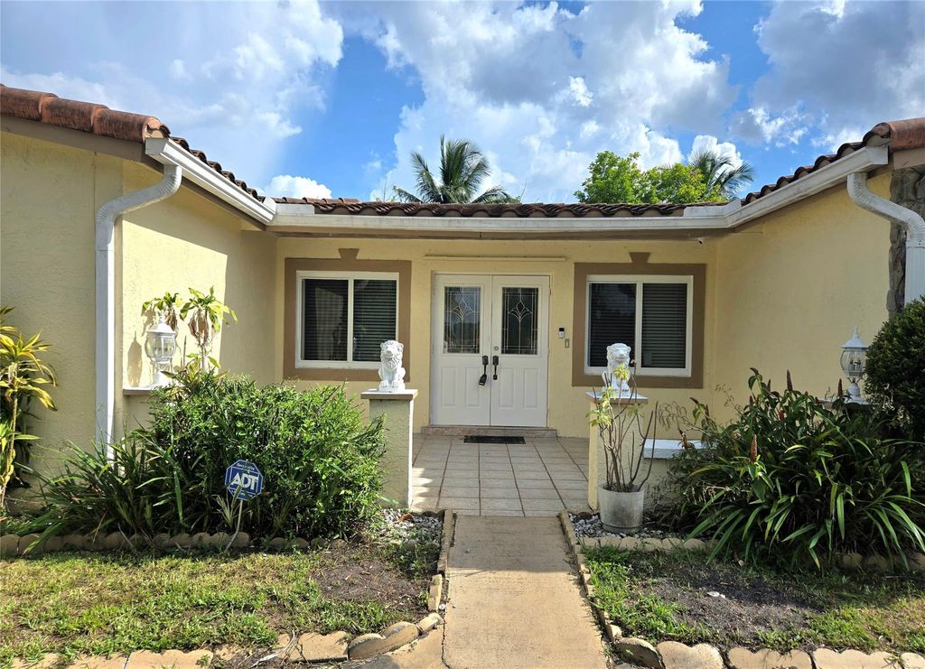 Photo of 4600 NW 39th Street, Lauderdale Lakes, FL 33319 (MLS # F10500421)