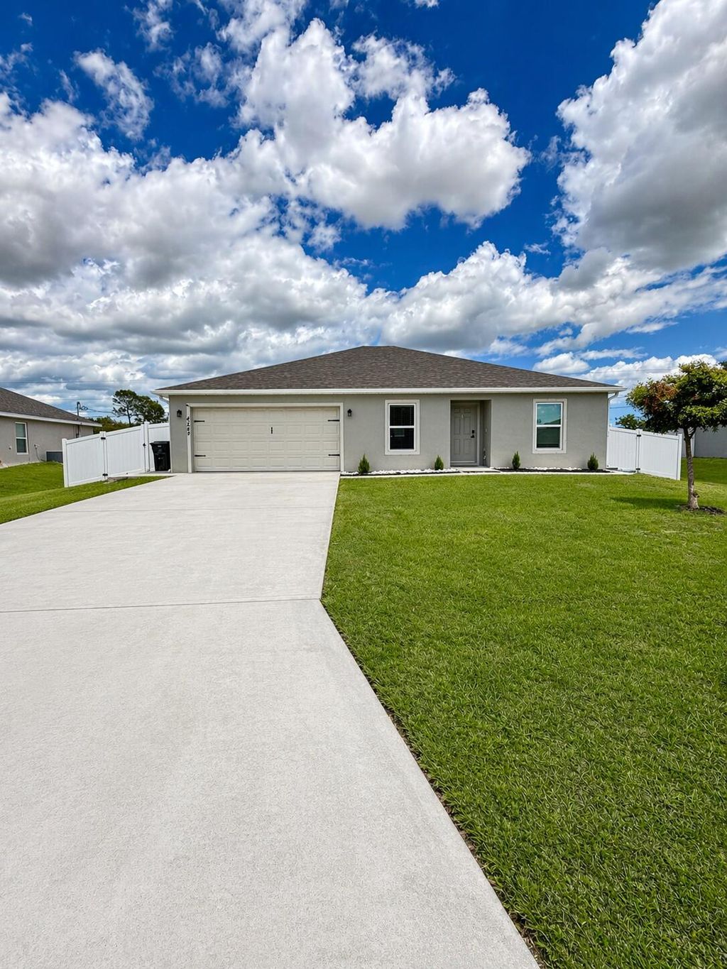 Photo of 4249 SW Whitebread Road, Port Saint Lucie, FL 34953 (MLS # B26019490)