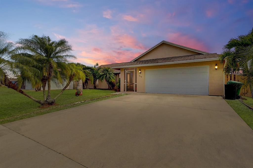 Photo of 510 SW Ray Avenue, Port Saint Lucie, FL 34983 (MLS # R10703668)