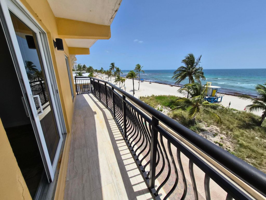 Photo of 1815 N Surf Road #404, Hollywood, FL 33019 (MLS # B26051058)
