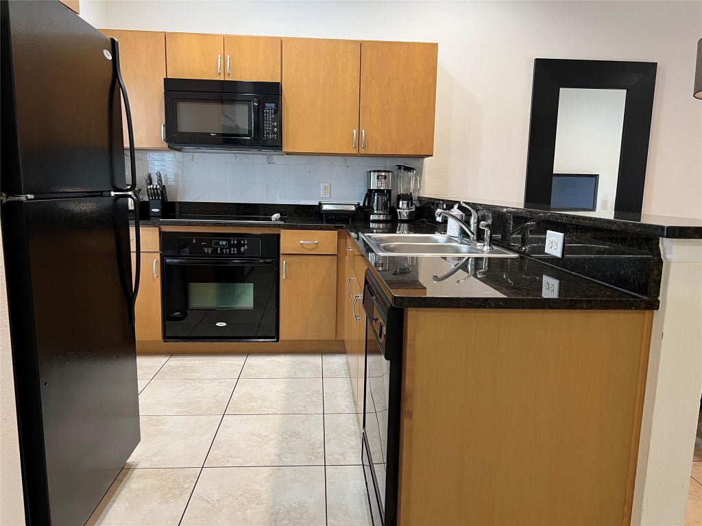Photo of 3018 Bird Of Paradise Lane #3018, Kissimmee, FL 34747 (MLS # F10549969)