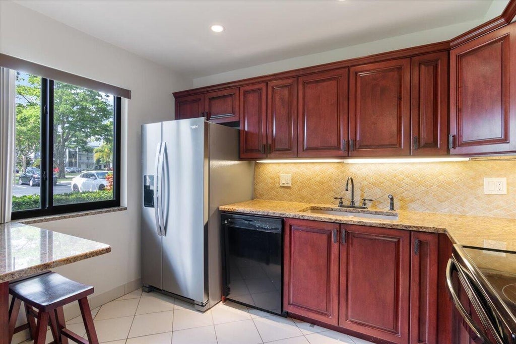 Photo of 4832 Esedra Court #102, Lake Worth, FL 33467 (MLS # R10878483)