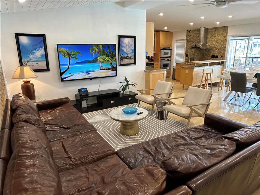 Experience the best of South Florida living in this stunning waterfront home with a private pool, available for monthly or yearly rentals (fully Furnished). Offering 3 bedrooms and 2 bathrooms, the home features a chef's kitchen with stainless steel appliances, a garage with laundry facilities, and both a screened front and rear patio. The backyard includes a spacious paver pool deck with an outdoor shower. Ample space to park an RV or boat in the large paver driveway with a carport. Conveniently located near major highways, FLL Airport, and the Hard Rock Hotel & Casino, this home is situated on a quiet, no-through-traffic street. Please note: Boat dockage is not included in the rental price but is negotiable.