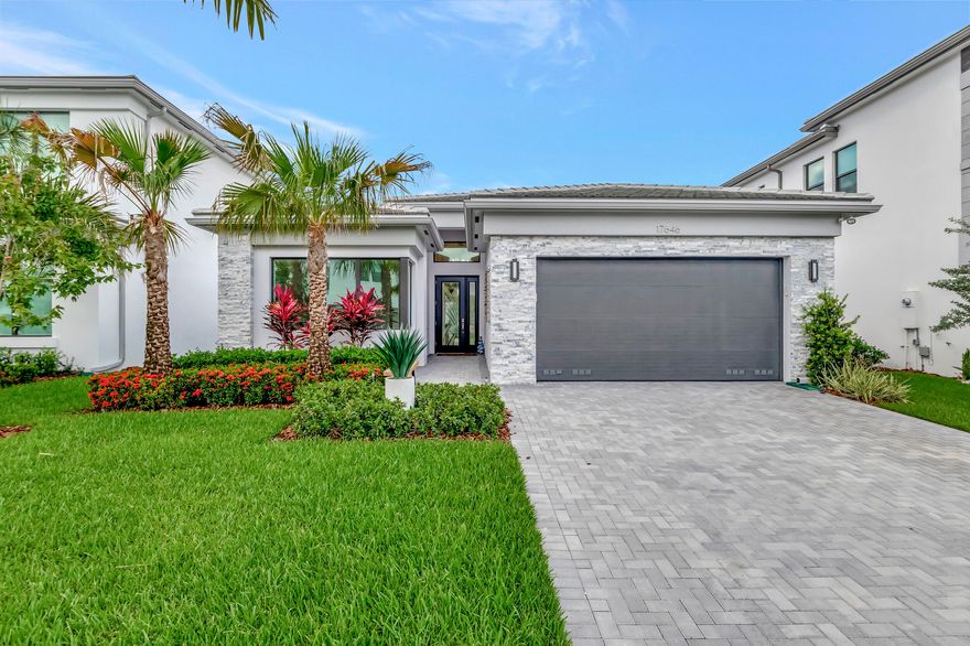 UPGRADES GALORE! NOTHING OVERLOOKED IN THIS BEAUTIFULLY APPOINTED, CONTEMPORARY MAUI MODEL, 3/3/2 + DEN + POOL WITH SOUTHERN EXPOSURE, PUTTING GREEN AND MOTORIZED PATIO SCREEN. THIS IS AN ENTERTAINER'S DREAM HOME WITH GREAT SPACES AND GAS COOKING! CALMING, NEUTRAL AND BEAUTIFULLY DECORATED. FITTED CLOSETS IN THE PRIMARY HIS/ HER CLOSETS, SOLAR PANELS, IMPACT GLASS WINDOWS, 40X40 MUD SET TILES IN MAIN LIVING AREAS AND DEN, CONCRETE BLOCK CONSTRUCTION TO THE ROOF, UPGRADED HI-END CABINETRY IN KITCHEN AND BATHS, BUILT-INS, GARAGE STORAGE AND SO MUCH MORE! A MUST SEE!