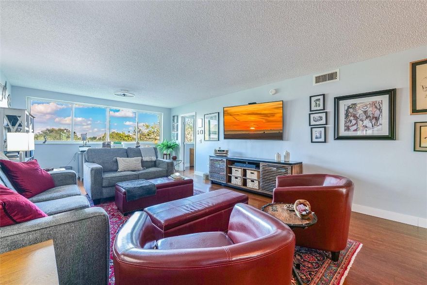 DESIREABLE 2/2 IN THE FAIRWAYS. 55+ COMMUNITY, THIS UNIT HAS IT ALL, ON THE 3nd FLOOR, WELL KEPT BUILDING #197. IMPACT WINDOWS!  SUPERBE,  EXTRA LARGE KITCHEN WITH QUARTZ COUNTERS AND STAINLESS STEEL APPLIANCES!  LOTS OF STORAGE!!  YOU WILL LOVE IT.  SMALL REFRIGERATOR IN LAUDRY RM DOES NOT CONVEY.  LAMINATE FLOORS, GREAT WATER  & GOLF VIEW., NEW TANKLESS WATER HEATER,  A/C 2021.  IT IS LOCATED ACROSS FROM SATELLITE CLUBHOUSE; POOL, SAUNA, BILLARD, TENNIS AND PICKLEBALL COURT. AMENITIES INCLUDES GOLF AND THEATER, AS WELL. ASSOCIATION REQUIRES $ 37,500 NET INCOME AND 700 CREDIT & DOWN PAYMENT: CASH:10%, IF FINANCED:20%. AN EXTRA $106/MONTH FOR RECREATIONAL LEASE ON TOP OF MONTHLY MAINTENANCE.  NO PETS AND NO RENTING ALLOWED. YOU HAVE TO COME SEE FOR YOURSELF!  GORGEOUS!!