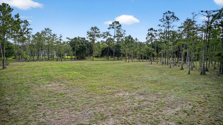 Executive, Professional & Equestrian Community where you can build your Retreat Lifestyle. This 5-acre pristine high & dry property is in Deer Run with 25 Miles of Bridal Paths. Deer Run is a gated community with paved roads, Wi-Fi included. Deer Run is a 243, 5 acre home site community located next to Lion Country Safari, Palm Beach State Collage, White Fences, and near Wellingtons equestrian activities.
Lot is cleared for a Homesite, Garage, Barn, Hobbie workshop. Also, it has shaded wooded areas, a wooden deck overlooking the water and is in the Wellington school system.