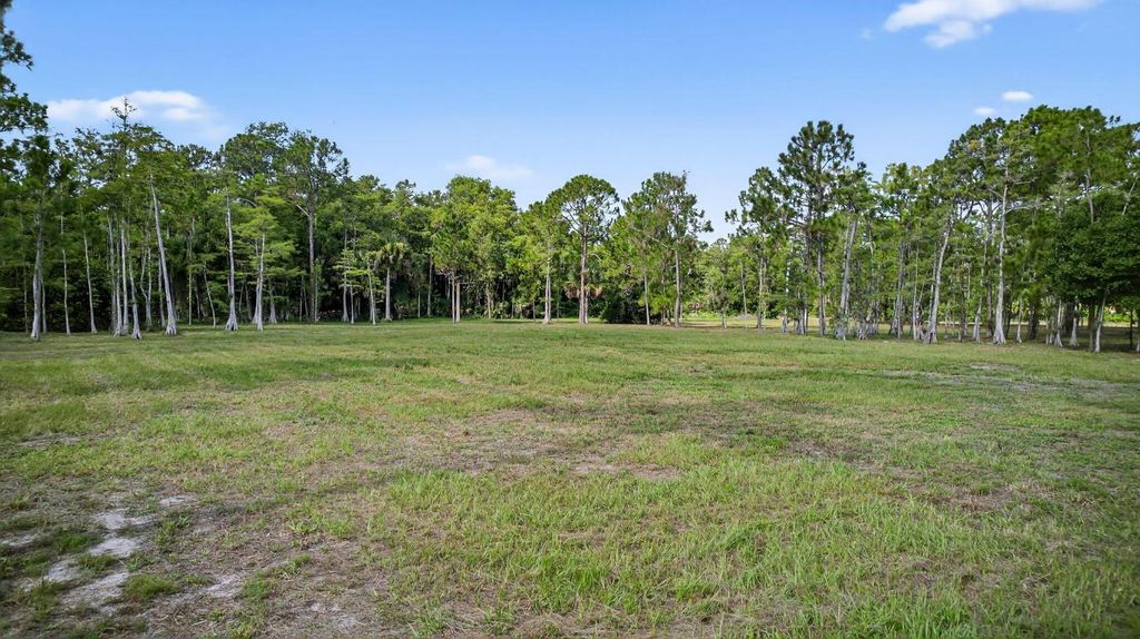 Photo of 2795 Doe Trail, Loxahatchee, FL 33470 (MLS # R11109256)