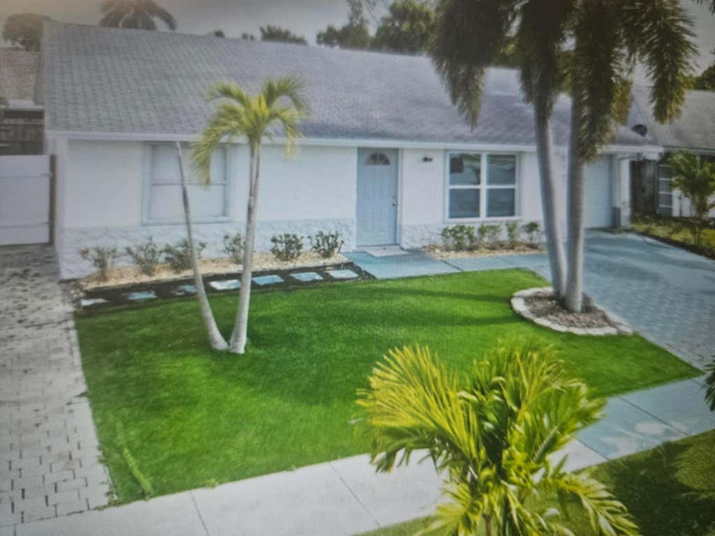 Photo of 6147 Moonbeam Drive, Lake Worth, FL 33463 (MLS # R11139366)