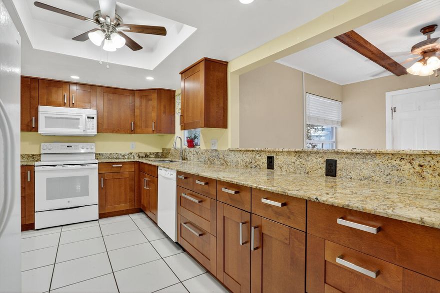 Welcome to 161 NW 24th Ct in Leisureville, one of Pompano Beach's most desirable 55+ active adult communities. This 2BR/2BA home offers 1,368 sq ft of living space plus a one-car garage, an updated kitchen, a brand-new 2025 roof for easy insurability, 2025 water heater, and a 2015 AC. The low $298/month HOA includes lawn care, water, two clubhouses, heated pools, free 9-hole golf, shuttle service, and a vibrant social calendar. Perfectly located just minutes to the beach, Whole Foods, Target, and dining, with Fort Lauderdale International Airport only 20 minutes away. A move-in ready, well-maintained home that delivers comfort, convenience, and lifestyle. Lessee/Owner must be 55+ and no one under 16 years old may reside in the home full time. PET Friendly - 2 pets allowed!
