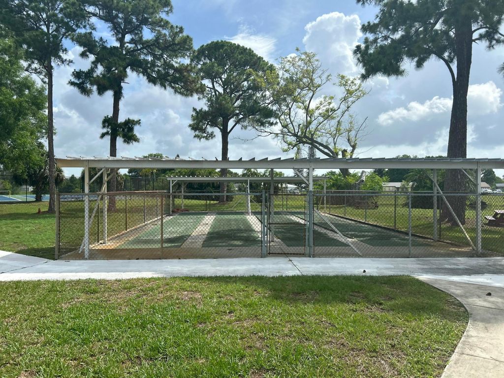 Photo of 410 SW Eastport Circle, Port Saint Lucie, FL 34953 (MLS # B26046867)