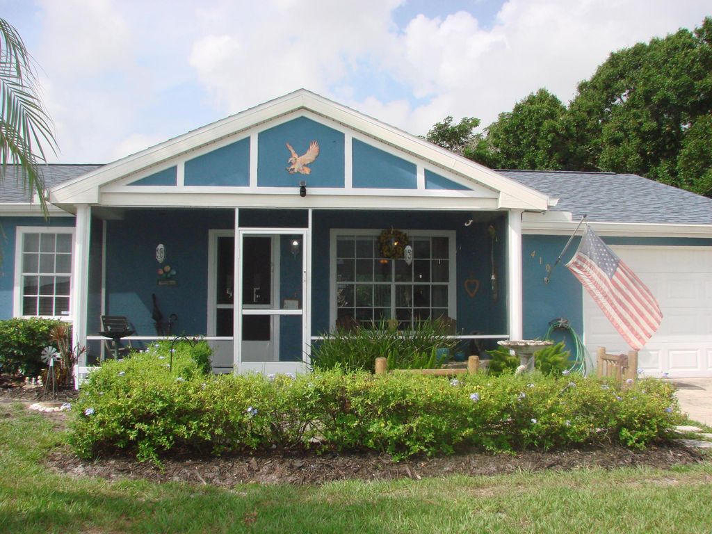 Photo of 410 SW Eastport Circle, Port Saint Lucie, FL 34953 (MLS # B26046867)