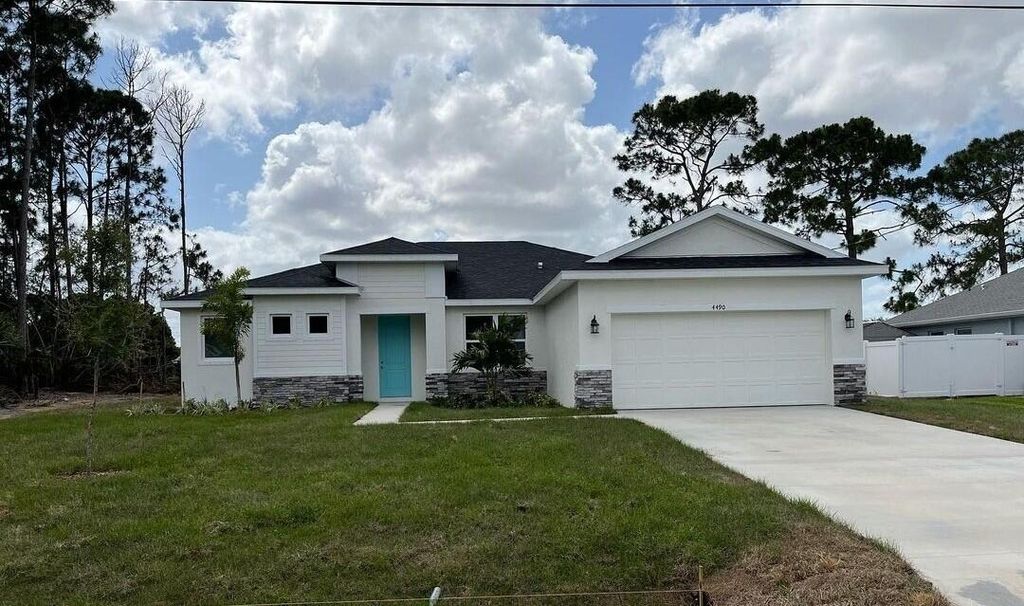Photo of 4490 SW Bradbury Street, Port Saint Lucie, FL 34953 (MLS # R10794985)