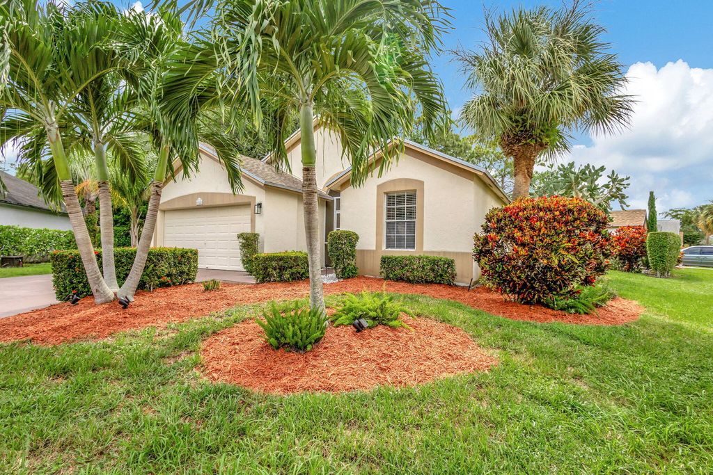Photo of 328 Hammocks Trail, Greenacres, FL 33413 (MLS # B26005993)