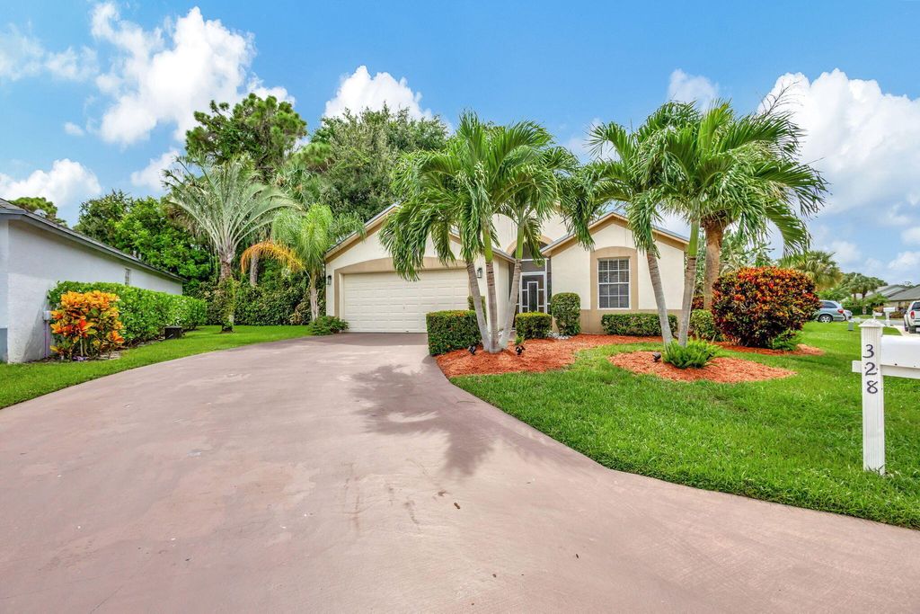 Photo of 328 Hammocks Trail, Greenacres, FL 33413 (MLS # B26005993)