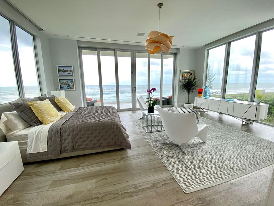 New oceanfront home features 4 bed, 5 baths w/approx over 7,000 sq.feet w/elevator & over-sized balconies. Open floor plan with unobstructed ocean to river views, enjoy sunrises and sunsets. Top-of-the line finishes include modern European kitchen. 38 x16 pool overlooks the golden sands of the Atlantic Ocean. Owner financing available. Sizes are approx/subj to error