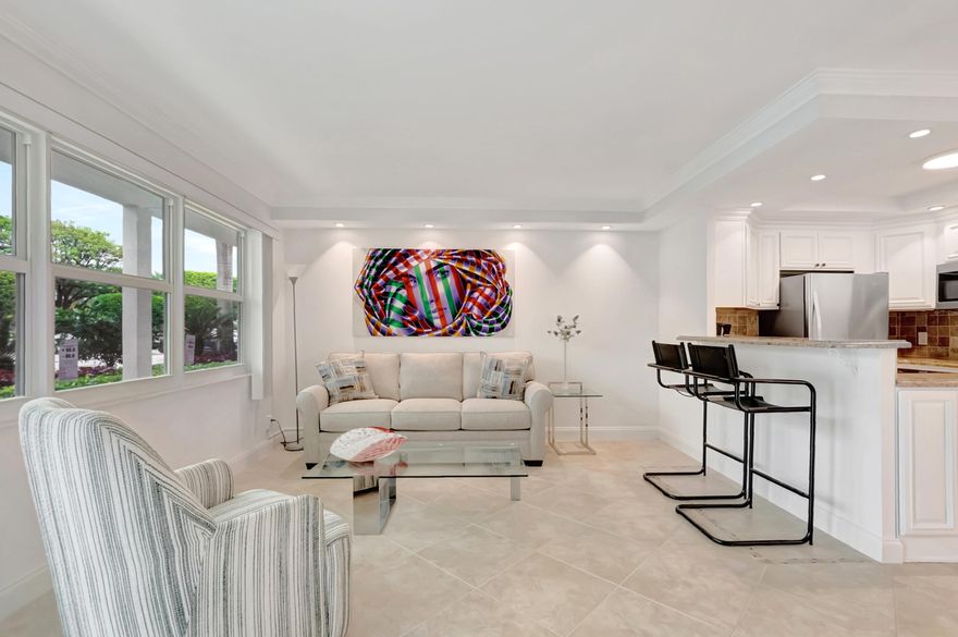 STUNNING RENOVATED! FIRST FLOOR WATERVIEW! Sparkling! Newly installed Hurricane proof windows and doors. Beautifully RENOVATED kitchen with the wall down, creating a GREAT room. Recently purchased furniture! MODERN WHITE kitchen walls and cabinets with black handles. Newly installed stainless-steel appliances! This 1 bedroom 1.5 bath has a very spacious feeling. Full bathroom renovated with new vanity and modern toilet and half bathroom has renovated tiles, vanity and toilet. Recessed lighting in kitchen, living room and bedroom., enhance the modern look of the condo. Desirable Yarmouth D, building, close to sidewalk path, parking and close to clubhouse and houses of worship! Yarmouth's pool is surrounded by the palm trees and the lake. Century Village Boca is located in upscale Boca. The village has biking paths, internal buses and connections with external busing.

There are free or discounted programs, galore! Come enjoy the fun of this 55 plus community!