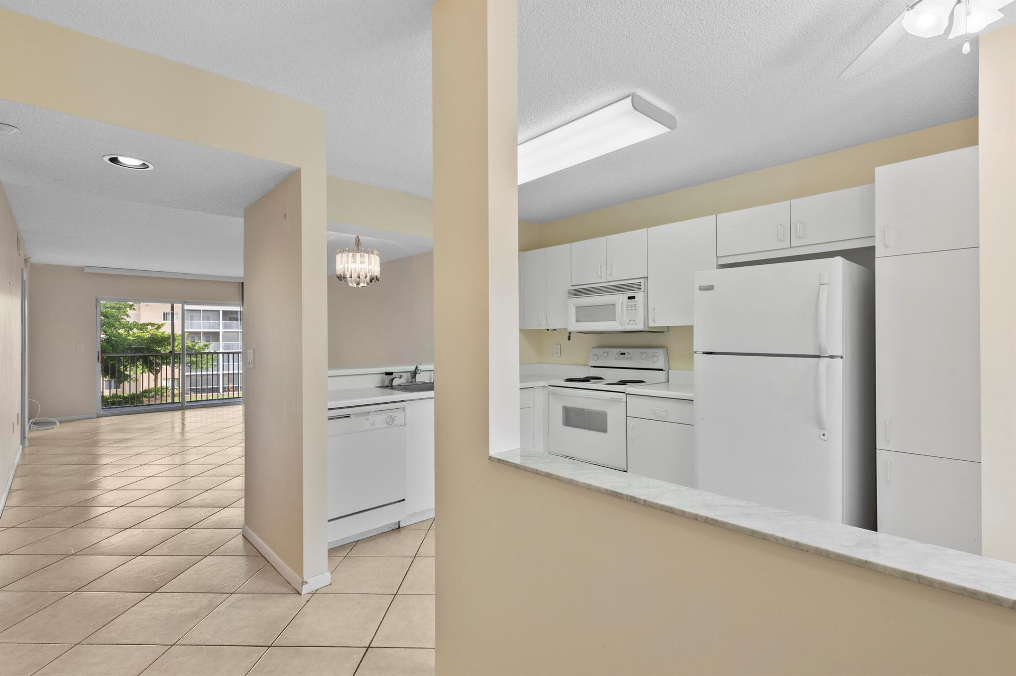 Price to Sell! Bright & Airy 2/2 condo located in desirable Kings Point in Tamarac, 55+ Gated Community on 3rd Floor with Lake view. This spacious unit features a relaxing breezy water view from the screened tiled patio. Large white kitchen with pass through to living room area. Carpet & tile flooring, A/C 2013. Large master bedroom with walk-in closet & stand-up shower with beautiful view from bedroom. The association offers The Palace Theatre is a 1007-seat State-Of-The-Art facility that provides a wide variety of top-draw entertainment in venues for Drama, Music, Comedy, Dance, & Film. Variety of games including Bingo, Canasta, Mah Jongg, Bridge, Tennis, Table Tennis, Billiards etc, Great Primary or Seasonal residence! Schedule your viewing today! Motivated Seller! More...-